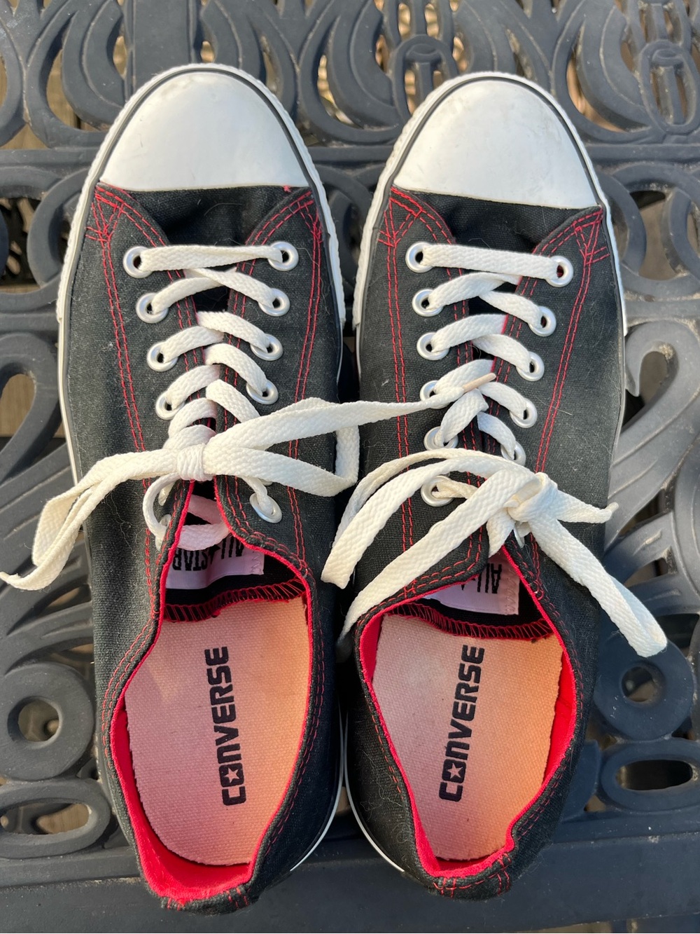 Unique Converse All Star Dark Navy Sneakers with Red  Liner/stitching.